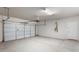 Spacious two car garage with epoxy flooring, insulated doors, and water heater at 2530 N Pony Ln, Casa Grande, AZ 85122