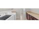 Laundry room with side-by-side washer and dryer and plenty of cabinet storage at 2530 N Pony Ln, Casa Grande, AZ 85122