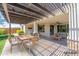 Large covered patio with comfortable seating, perfect for outdoor dining and relaxation at 26733 W Melinda Ln, Buckeye, AZ 85396