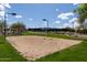 Sand volleyball court with nets set up for a fun game under the blue sky at 26733 W Melinda Ln, Buckeye, AZ 85396