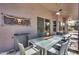 Back patio seating with landscaped backyard and outdoor dining area at 29023 N 48Th Ct, Cave Creek, AZ 85331
