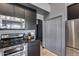 Kitchen detail with stainless steel appliances and gray shaker style cabinetry at 29023 N 48Th Ct, Cave Creek, AZ 85331