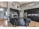 Modern kitchen with a large island, black cabinetry, and stainless steel appliances at 29023 N 48Th Ct, Cave Creek, AZ 85331