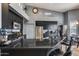 Stylish kitchen features a stainless steel refrigerator, gas stovetop, and a wine refrigerator at 29023 N 48Th Ct, Cave Creek, AZ 85331