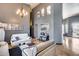 Open-concept living room with high ceilings, hardwood floors, and comfortable white sofas, perfect for modern living at 29023 N 48Th Ct, Cave Creek, AZ 85331
