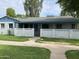 Charming single-story home with a fenced front yard and covered patio at 2925 N 19Th Ave # 97, Phoenix, AZ 85015