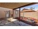 Charming backyard with covered patio, colorful raised garden beds, and detached shed at 3030 W Christy Dr, Phoenix, AZ 85029