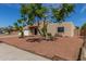 Exterior of charming home showcasing well-maintained desert landscaping at 3030 W Christy Dr, Phoenix, AZ 85029