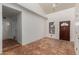 Inviting Living Room with eye-catching Saltillo tile flooring and great natural lighting at 3030 W Christy Dr, Phoenix, AZ 85029