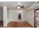 Open-concept living area with Saltillo tile flooring and views to the front entryway at 3030 W Christy Dr, Phoenix, AZ 85029