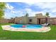 Private backyard oasis featuring a sparkling pool and lounge area at 3030 W Christy Dr, Phoenix, AZ 85029