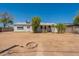 The house features a large backyard and a fire pit at 3441 W Sweetwater Ave, Phoenix, AZ 85029