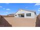 Large backyard with an expansive dirt area, perfect for landscaping or recreational activities at 37785 W Santa Maria St, Maricopa, AZ 85138