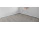 Clean, bright bedroom with light carpet and a bright window at 37805 W Santa Maria St, Maricopa, AZ 85138