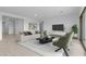 Bright living room with neutral furniture, stylish decor, and light wood floors at 37805 W Santa Maria St, Maricopa, AZ 85138