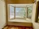 Cozy breakfast nook featuring a bay window seat and tiled flooring at 3877 W Butler St, Chandler, AZ 85226