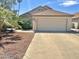 Charming single-story home with well-maintained landscaping and a two-car garage at 3877 W Butler St, Chandler, AZ 85226