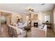 Inviting living room with a stone fireplace, plush seating, and elegant decor at 3912 E Ellis St, Mesa, AZ 85205