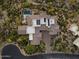 Stunning aerial view of a luxury home with a private pool and landscaped grounds at 39254 N 104Th Pl, Scottsdale, AZ 85262