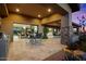 Expansive outdoor living space with dining area, built-in grill, and desert landscaping at 39254 N 104Th Pl, Scottsdale, AZ 85262