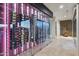 Custom, climate-controlled glass wine cellar with storage for hundreds of bottles at 39254 N 104Th Pl, Scottsdale, AZ 85262