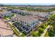 Aerial view of a townhome community with lush landscaping and well-maintained streets at 4077 S Sabrina Dr # 14, Chandler, AZ 85248