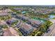 High angle view of townhomes, pond, and palm trees in a community at 4077 S Sabrina Dr # 14, Chandler, AZ 85248