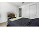 Bedroom features a television, large closet, carpeting and natural lighting. A great space to retreat at 4077 S Sabrina Dr # 14, Chandler, AZ 85248