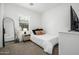 Cozy bedroom features carpet, a mirror, and a window with a view. Simple and bright at 4077 S Sabrina Dr # 14, Chandler, AZ 85248