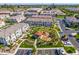 Aerial view showcasing a townhome community with a neighborhood park at 4077 S Sabrina Dr # 14, Chandler, AZ 85248