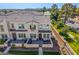 An aerial view of a two-story house with a gated patio and clay tile roof at 4077 S Sabrina Dr # 14, Chandler, AZ 85248