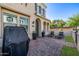 Private brick-paved patio with lounge chairs, perfect for relaxation and outdoor entertainment at 4077 S Sabrina Dr # 14, Chandler, AZ 85248