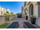 Townhouse patio with chairs and grill for enjoying the outdoors at 4077 S Sabrina Dr # 14, Chandler, AZ 85248