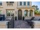 Home exterior with patio featuring brick pavers, lounge seating and an outdoor grill for cooking at 4077 S Sabrina Dr # 14, Chandler, AZ 85248