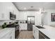 Beautiful kitchen featuring stainless steel appliances, white cabinets, and quartz countertops at 4077 S Sabrina Dr # 14, Chandler, AZ 85248