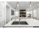Modern kitchen with stainless steel appliances, white countertops, and an undermount sink at 4077 S Sabrina Dr # 14, Chandler, AZ 85248