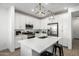 Bright kitchen with white cabinets, stainless steel appliances, and a stylish center island at 4077 S Sabrina Dr # 14, Chandler, AZ 85248