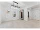 Grand foyer showcases decorative lighting, shuttered windows, and an ornate iron door at 4547 S Banning Dr, Gilbert, AZ 85297