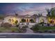 Stunning single-story home with lush landscaping, paver walkway, and barrel tile roof at 4547 S Banning Dr, Gilbert, AZ 85297