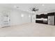 Open concept kitchen area with tile flooring and dark wood cabinets at 4547 S Banning Dr, Gilbert, AZ 85297