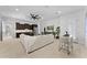 Bright open-concept living room with kitchen and dining area nearby at 4547 S Banning Dr, Gilbert, AZ 85297