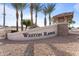 Community sign for Weston Ranch with well-maintained landscaping at 4547 S Banning Dr, Gilbert, AZ 85297
