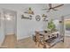 Cozy dining area featuring rustic table, bench seating, and decorative shelving at 515 W Smoke Tree Rd, Gilbert, AZ 85233