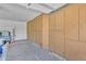 Spacious garage with built-in cabinets for ample storage space at 515 W Smoke Tree Rd, Gilbert, AZ 85233