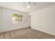Bright bedroom with neutral carpet and view of the outside at 5423 S Palm Dr, Tempe, AZ 85283