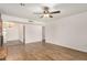 Spacious living room with new flooring and a view of the dining area at 5423 S Palm Dr, Tempe, AZ 85283