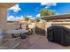 This private patio is fenced and has a patio table at 5808 E Brown Rd # 119, Mesa, AZ 85205