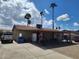 Spacious backyard features a covered patio area and extra space for parking and activities at 5916 W Coronado Rd, Phoenix, AZ 85035