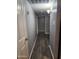 Hallway features wood-look tile flooring and gray walls at 5916 W Coronado Rd, Phoenix, AZ 85035