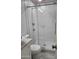 Modern bathroom featuring a beautifully tiled shower with glass door at 5916 W Coronado Rd, Phoenix, AZ 85035
